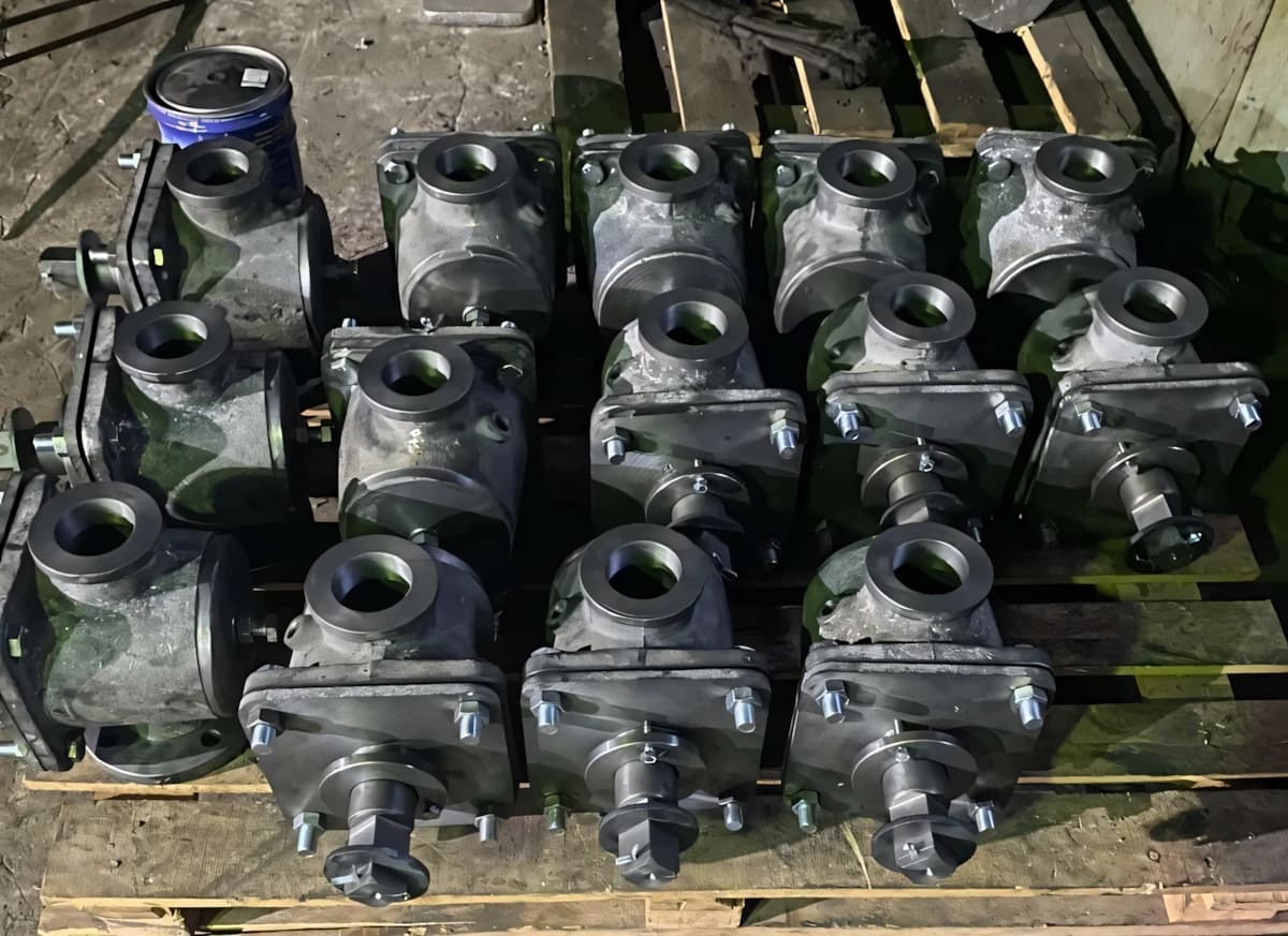 Machined grey cast iron parts on a pallet