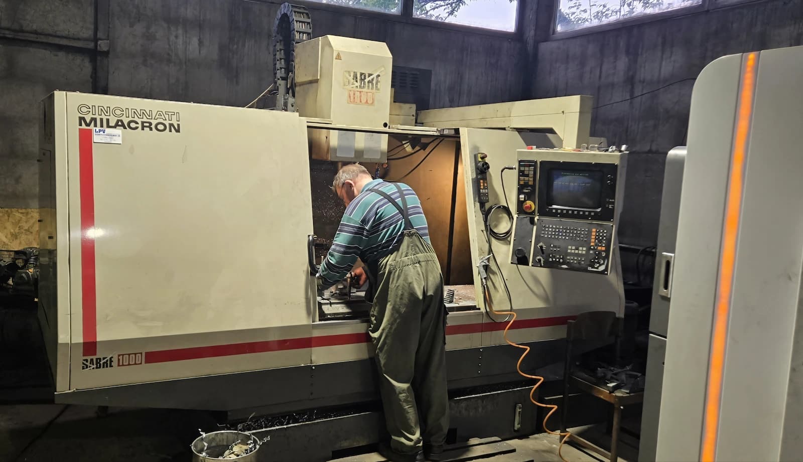 CNC machining center operator during final finishing of a casting at MetallKontrakt